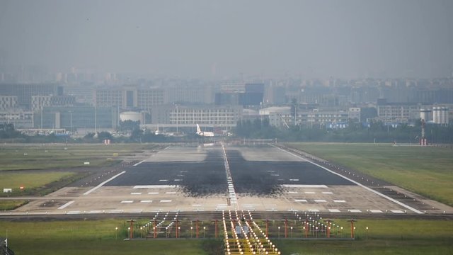 Commercial airplane landing at Chengdu International airport, Sichuan province, China