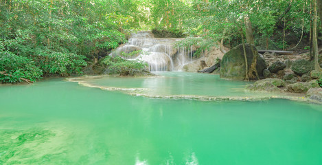 Naklejka na ściany i meble beautiful deep forest waterfall in Thailand