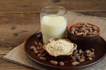 Сhufa milk and tigernut flour. Alternative type of milks. Vegan non-dairy milk. Lactose-Free Milk and Nondairy Beverages. Lactose intolerance. Gluten free. Grain free. Healthy food. Superfood.