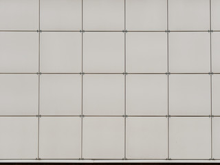 wall of decorative cladding metal panels. background
