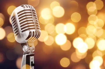 Retro style microphone on  background