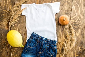 T-Shirt Mockup on a Wooden Background with pumpkins