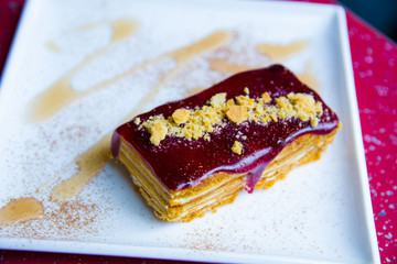 a sweet dessert cake sprinkled with nuts