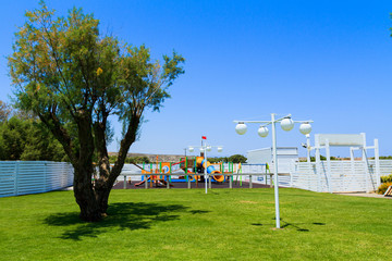 Children's wooden playground recreation area at public park