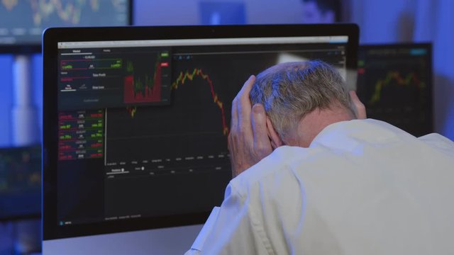 Tired broker monitoring stock growth