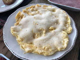 Foamy and Fluffy Omelette with Foam Homemade Mont Saint Michel Style for Breakfast. Organic Food.