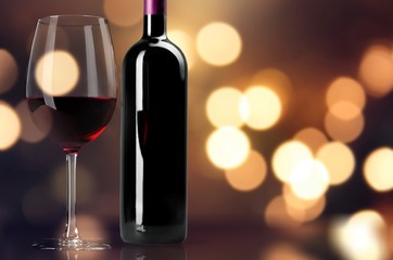 Red Wine in Bottle and Glass on white background