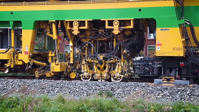 Big Maintenance Train That Looks Like a Caterpillar on a Railway Repairing the Tracks, Dutch City Leeuwarden, Friesland, The Netherlands