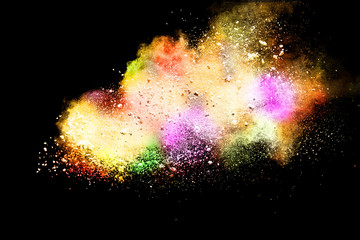 Abstract powder splatted background. Colorful powder explosion on black background. Colored cloud. Colorful dust explode. Paint Holi.