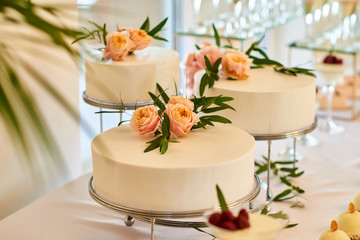 Sweet table on the wedding with delicious desserts.