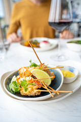 Shrimp Tempura with Almonds and Mango Lemon Sauce in Luxury Restaurant