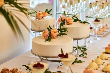 Sweet table on the wedding with delicious desserts.