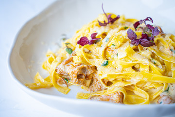 Pasta with Chanterelles and Cream Sauce in Luxury Restaurant, Romantic Dinner