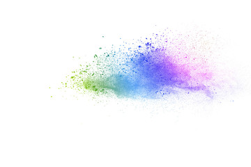 Freeze motion of colorful color powder exploding on white background.  Paint Holi.