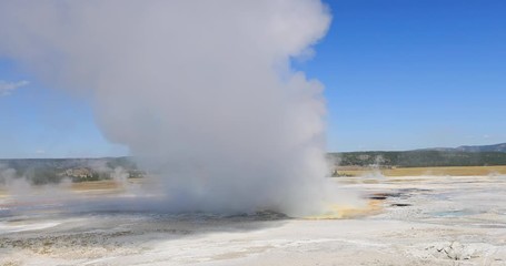 Yellowstone National Park beautiful blue geyser basin. Geothermal ecosystem environment. Super volcano biology, geography and ecology. Millions of tourist and visitors each year. 