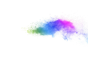 Freeze motion of colorful color powder exploding on white background.  Paint Holi.