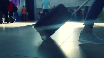 Defocusing. Busy Airport Terminal. Traveler at airport 