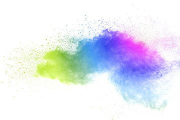 Freeze motion of colorful color powder exploding on white background.  Paint Holi.