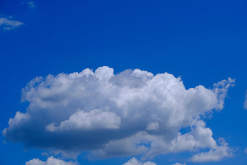 Naklejka na ściany i meble Clouds against the blue sky