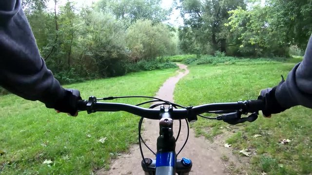 MTB bicycle riding on the trails in the summer season
