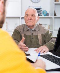 Retired and agent sign insurance contract