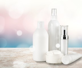 Cosmetic containers isolated on background