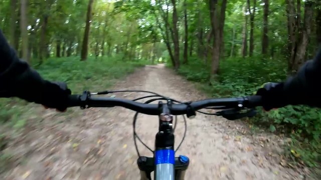 MTB bicycle riding on the trails in the summer season