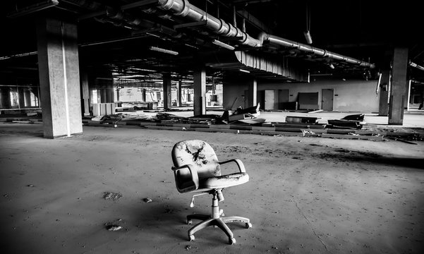 Black And White Dusty Office Seat In An Abandoned Building