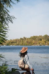 Foto op Canvas girl on a lake © Наталья Добровольска