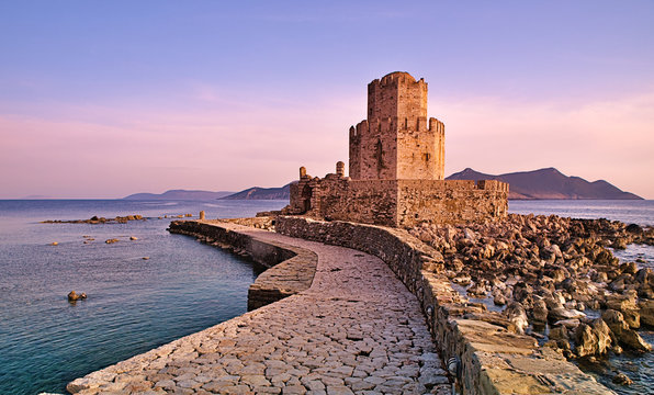 Impressive three-tiered watchtower, Venetian fort castle of Methoni, Greece at sunset time.