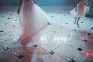 bride in white dress on dance floor