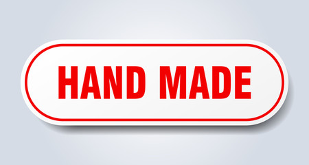 hand made sign. hand made rounded red sticker. hand made