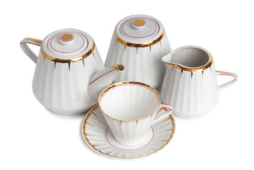 Antique porcelain tableware for tea on a white background