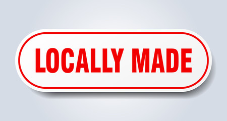 locally made sign. locally made rounded red sticker. locally made