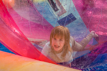 girl in water zorb on the water