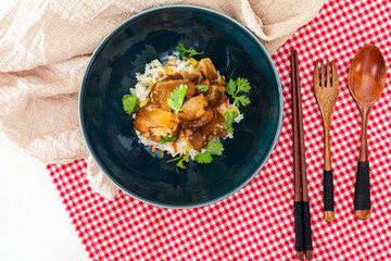 Asian style caramel pork with rice and vegetable