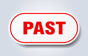 past sign. past rounded red sticker. past
