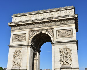 Fototapeta na wymiar Arc de Triomphe from Champs Elysees with blue sky. Paris, France.