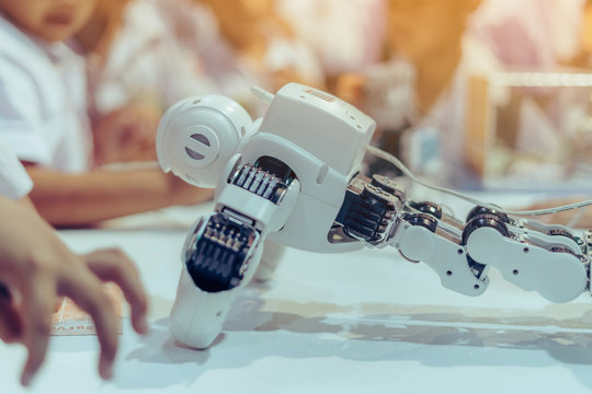 Students Are Testing Robot Control In An Elementary School Laboratory.