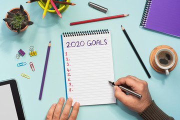 To Do list For New Year 2020, Over Head View Of Work Desk.