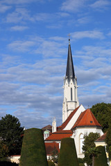 White church and garden Vienna Austria