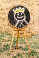 Emoticon with crown  like a  target for shooting