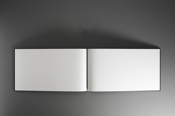 Blank white mock up sheets of open notebook or album at abstract grey background.