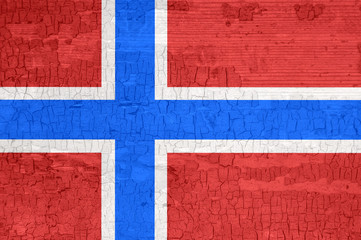 Norway flag on an old painted tattered wooden surface.