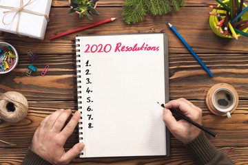 To Do list For New Year 2020, Over Head View Of Work Desk.