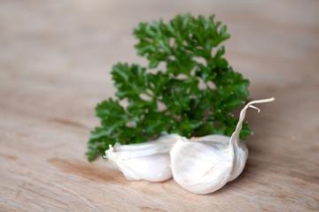 Parsley and Garlic on Wooden Surface