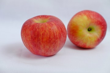 Red apples on white background