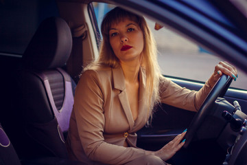 young woman in a car