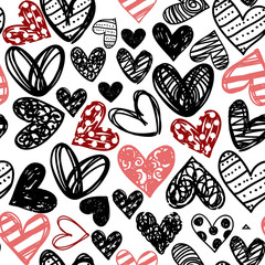 Vector seamless doodle pattern with scribbled red, pink and black hearts of various sizes on white background. 