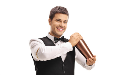 Barman making a cocktail with a shaker - obrazy, fototapety, plakaty